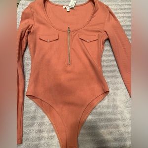 Long sleeve pink bodysuit